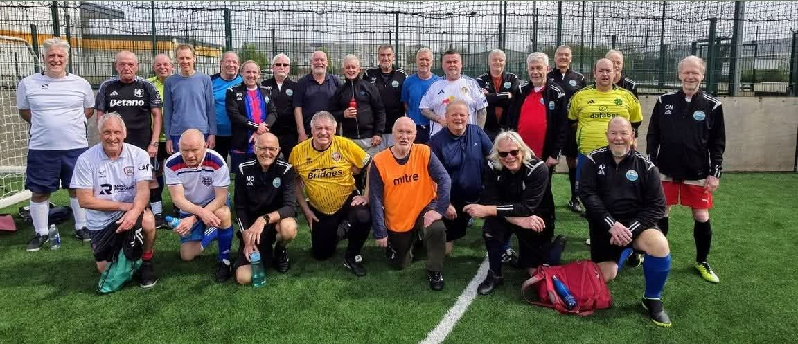 Replace with a wide landscape photograph of a welcoming mixed group of GWFC players on the 5G pitch. Friendly and informal in tone; leave a text-safe area on the left half for the heading, tagline and CTA. A separate portrait or tighter mobile crop may be required.